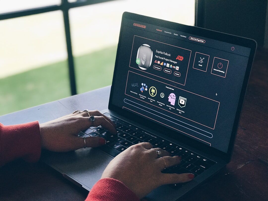 person browsing cars online on laptop