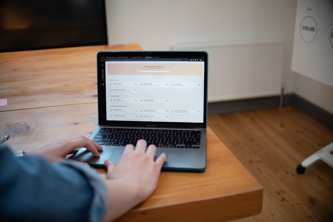 person browsing cars online on laptop