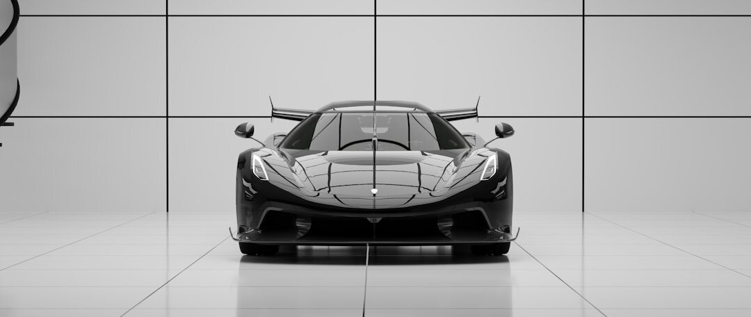Dark editorial photo of a luxury performance car in a minimalist studio