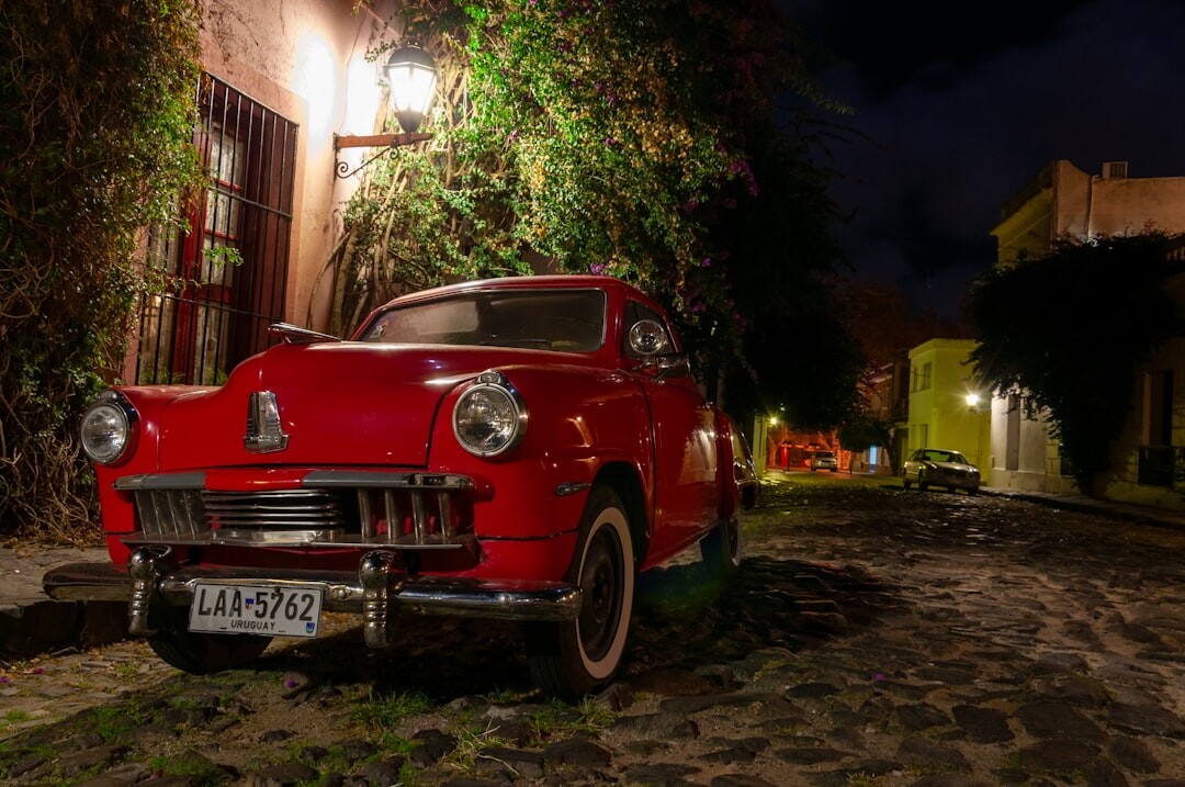 Cobblestone street in Colonia del Sacramento with a classic car parked