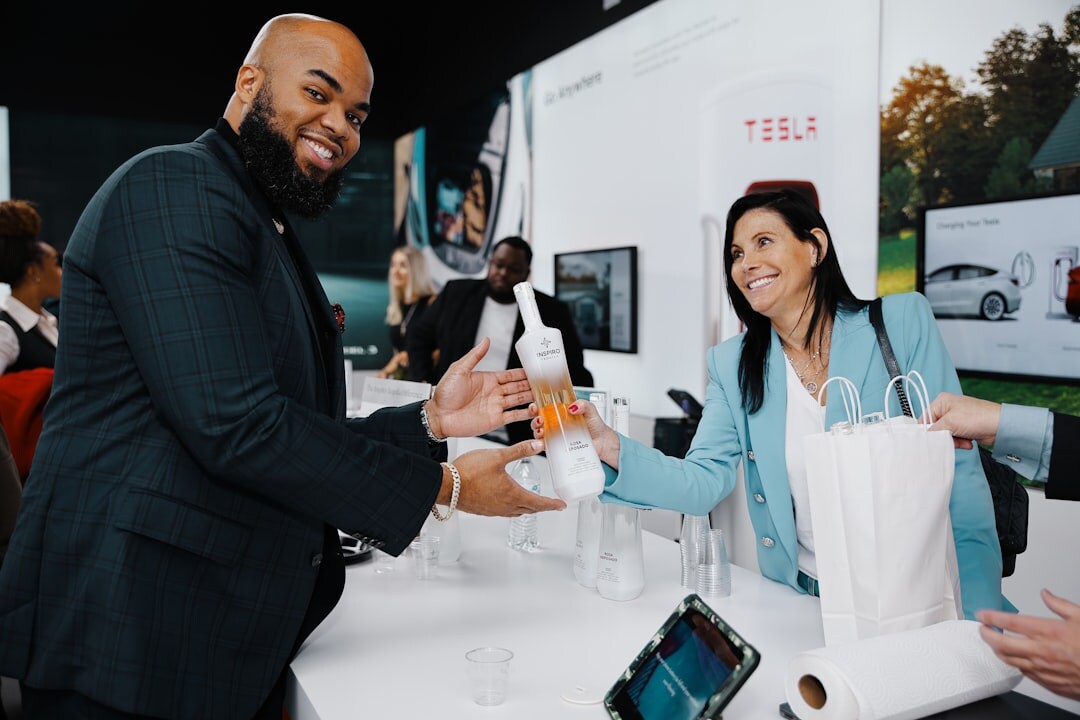 happy car buyer shaking hands