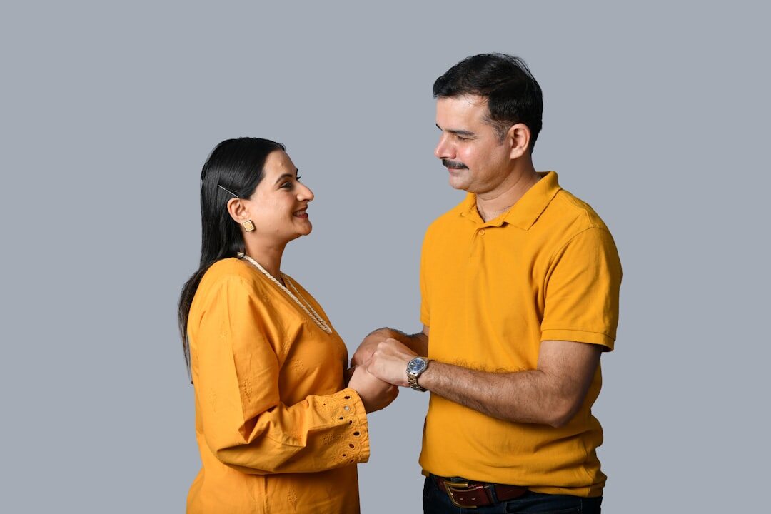 happy car buyer shaking hands